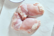 Load image into Gallery viewer, Chicken Thigh Bone In  $ 1.50 per LB
